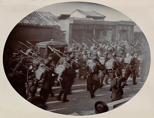 Troops of the Wuwei Corps led by Yuan Shikai escorting Empress Dowager Cixi back to the Forbidden City in 1902