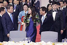 President Rodrigo Duterte and his partner Cielito Avancena are welcomed by South Korean President Moon Jae-in to the Cruise Grand Ballroom of the Hilton Busan Hotel for the welcome dinner hosted by the South Korean President on November 25, 2019. 20191125-A-ARMN-2.jpg