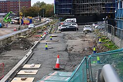 The site of the listed Earl De Grey pub, dismantled by Hull City Council prior to the commencement of the Castle Street Improvement Scheme, adjacent to the A63 along Castle Street in Kingston upon Hull. The thinned section of kerbing may suggest where the footprint of the pub may sit when it is eventually rebuilt.