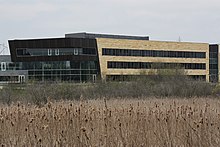 Exterior view of Anytime Fitness headquarters in Woodbury, Minnesota. Image taken in 2016. AF HQ Exterior - View from Trail (42556375075).jpg