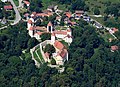 * Nomination Aerial image of the Schloss Neuburg am Inn (view from the southeast) --Carsten Steger 06:13, 21 September 2021 (UTC) * Promotion  Support Good quality. IMO the bright midtones should be reduced. --XRay 06:18, 21 September 2021 (UTC)