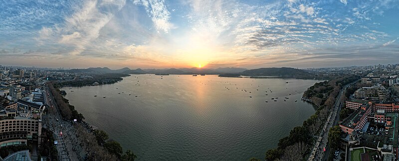 File:Aerial panorama of West Lake sunset and its lakeside district. December 2023.jpg