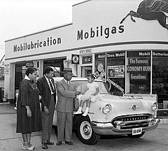 An African American family with their new Oldsmobile in Washington, D.C., 1955 African Americans with Oldsmobile.jpg