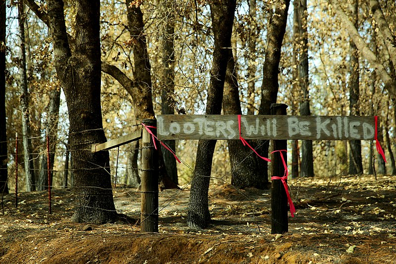 File:After the Butte fire scorched the mountain community of Mountain Ranch, the residents warn looting criminals with a stern sign. Many of the residents are working together to neighbo - DPLA - faa592ef46ade85b3bd24dca7f5bfec5.JPG