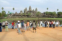 Every year, nearly 2.6 million tourists visit Angkor Wat in Siem Reap, Cambodia. Angkor Wat Tourists.jpg