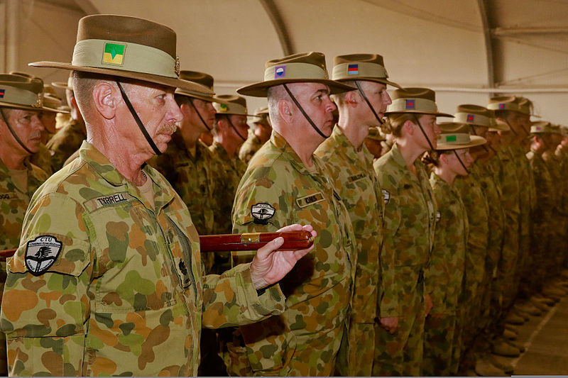 File:Australian Army Warrant Officer Class One Paul Tyrrell, left, the regimental sergeant major of Combined Team Uruzgan, and fellow team members attend a ceremony transferring authority for the team from Col. Simon 130807-O-MD709-038-AU.jpg