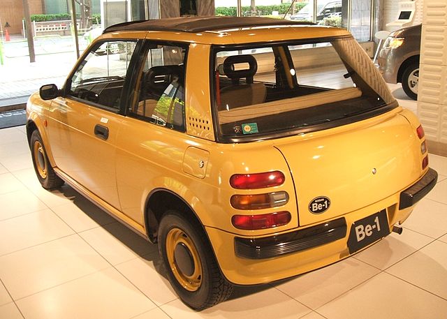 Nissan Be-1 finished in Pumpkin Yellow (rear)