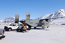 Alaska National Guard C-23 on an unimproved frozen runway in the Alaskan village of Anaktuvuk Pass to deliver medical supplies. C-23 at Anaktuvuk Pass.jpg