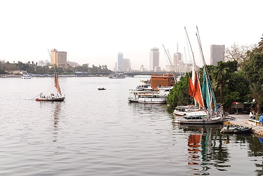 The Nile flows through Cairo, here contrasting ancient customs of daily life with the modern city of today.