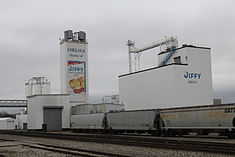 Grain elevators at the Chelsea Milling Company, manufacturer of Jiffy mix products, in Chelsea, Michigan Chelsea Milling Company.JPG