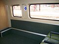 Some carriages have seats removed in the vestibule to make room for wheelchairs