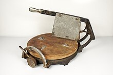 A computing cheese cutter manufactured by the Computing Cheese Cutter Company, Incorporated, Anderson, Indiana, USA. Patented May 23, September 26, 1903 ComputingCheeseCutter.jpg