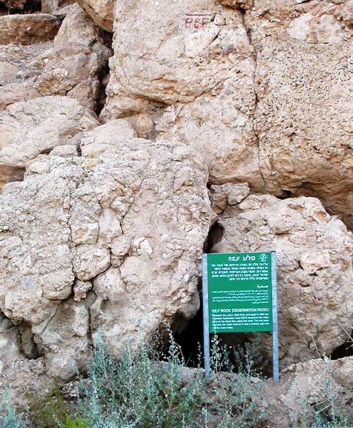 PEF rock: Mark on boulder used by the PEF as a reference level (datum) for surveying the Dead Sea in the beginning of the 20th century