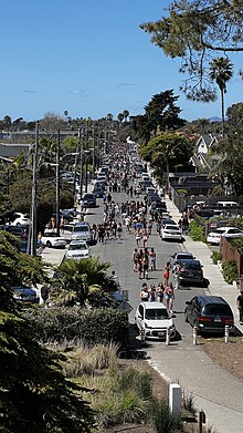 Partygoers on Del Playa Drive during Deltopia, April 2024 Del Playa Drive on Deltopia 2024.jpg