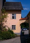 Rectory and outbuildings as well as archway