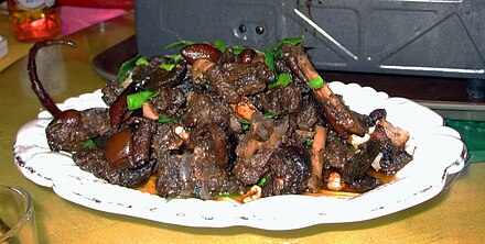 A platter of cooked dog meat in Guilin, China