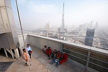 Construction workers from Asia on top floor of the Angsana Tower Dubai workers angsana burj.jpg