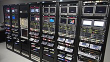 19-inch racks of Professional Disc decks at Fuji TV Fuji TV (5712870769).jpg
