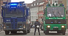 Wasserwerfer 9000 pictured on the right beside its successor, the Wasserwerfer 10000 G7 2015 Summit preparation in Lubeck1.jpg