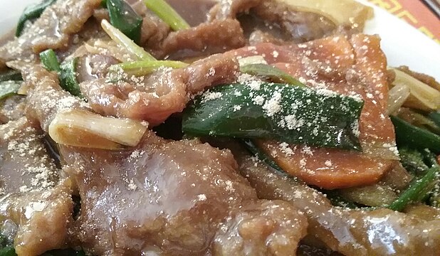 A dish of Chinese stir-fried Ginger and Onion Beef.