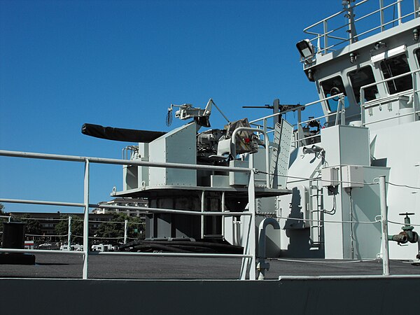 The formerly fitted Bofors 40 mm Model 60 Mk 5C rapid fire gun on the forecastle deck of HMCS Nanaimo. One of the two 12.7 mm (.50 cal) machine guns c