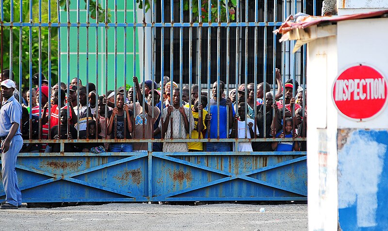 File:Haitians in Port-de-Paix await distribution of relief supplies 2010-01-15.jpg