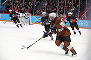 English: Bronze medal match of the Boys' 3x3 mixed Ice hockey tournament at the 2020 Winter Youth Olympics in Lausanne. Deutsch: Spiel um den dritten Platz des 3x3-Mixed-Eishockeyturniers der Jungen bei den Olympischen Winter-Jugendspielen 2020 in Lausanne.