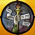 * Nomination a torch and banner depicted on a stained glass window in Tennessee. --Nheyob 13:40, 18 December 2020 (UTC) * Decline  Oppose not enough detail --MB-one 21:28, 26 December 2020 (UTC)