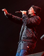 Lipa and J Balvin collaborated on "Un Dia (One Day)". J Balvin 2015, Austin (cropped).jpg