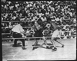 July 4, 1923: Remote town of Shelby, Montana, bankrupted by staging heavyweight boxing bout Jack Dempsey and Tommy Gibbons in boxing match, Shelby, Montana, July 4, 1923 (MOHAI 1324).jpg