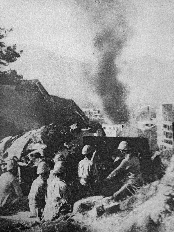 Japanese artillery firing at Hong Kong