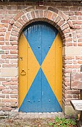 Castle Doorwerth Wooden door in outbuilding.