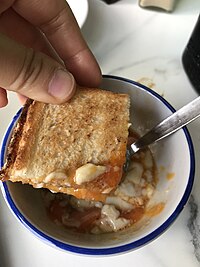 Kaya toast dipped into soft-boiled egg Kaya toast dip into soft boiled egg.jpg