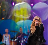 Kesha finished the 2000s at the top of the chart with her hit, "Tik Tok", with a 12-week run that continued through March 2010. Kesha MMVA crop.jpg