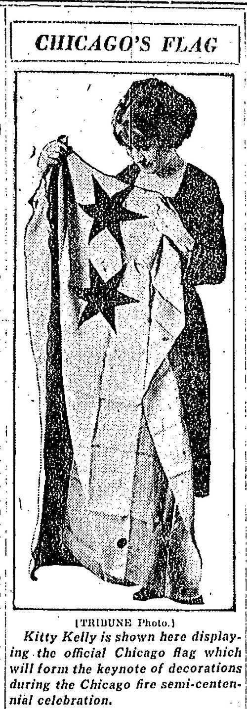 Kitty Kelly holding Flag of Chicago from the Chicago Tribune, 1921. Note the two stars on the flag at the time.