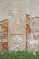 náhrobní kameny ve zdi kostela svatého Vavřince