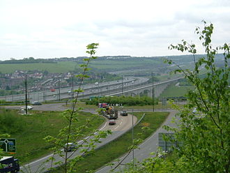 The M2 motorway, and the raillink crossing the Medway, between Cuxton and Borstal. The Nashenden valley on the other bank is typical of Kentish downland scenery. M2RailLinkBridgeOverMedway9928.JPG