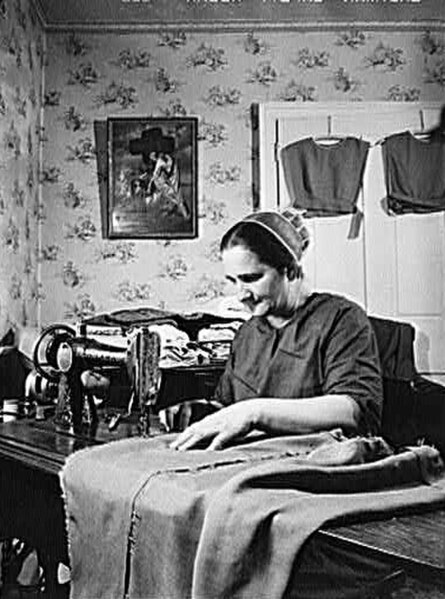 Mennonite woman dressmaking (1942)