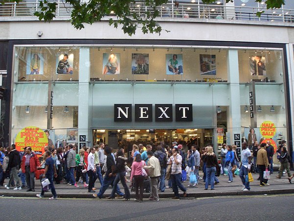 A branch of Next showing the old logos on Oxford Street in London in 2005