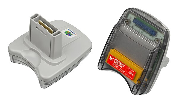 The Transfer Pak. The front has a component that fits into the Nintendo 64 controller's expansion port; the rear features a Game Boy cartridge slot.