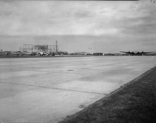 Sola Airport being opened, to the right a Deutsche Luft Hansa Junkers G.38