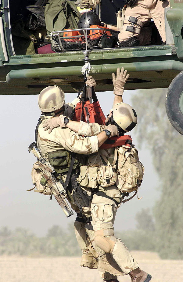 U.S. Air Force Pararescue personnel assigned to Baghdad International Airport (BIAP), perform a hoist extraction of a survivor during an Urban Operati