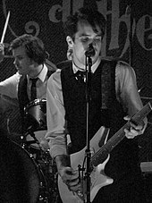 Smith and Urie became the remaining original members of the band after the departure of Ross and Walker. PanicatBowery2011.jpg