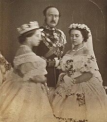 Left to right: Queen Victoria, Prince Albert, and Victoria, Princess Royal, in the clothes they wore for the princess's wedding Queen Victoria, the Prince Consort and Victoria, Princess Royal in the dress they wore at the marriage of Princess Royal.jpg