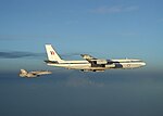 A No. 33 Squadron B-707 refueling a US Navy F/A-18 in 2002