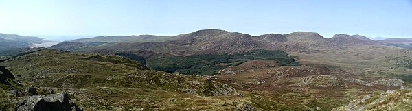 Panorama of the Rhinogau from the summit of Y Garn with the River Mawddach estuary at far left and Diffwys, Crib y Rhiw, Y Llethr, Rhinog Fach and Rhinog Fawr from left to right Rhinogau panorama.jpg