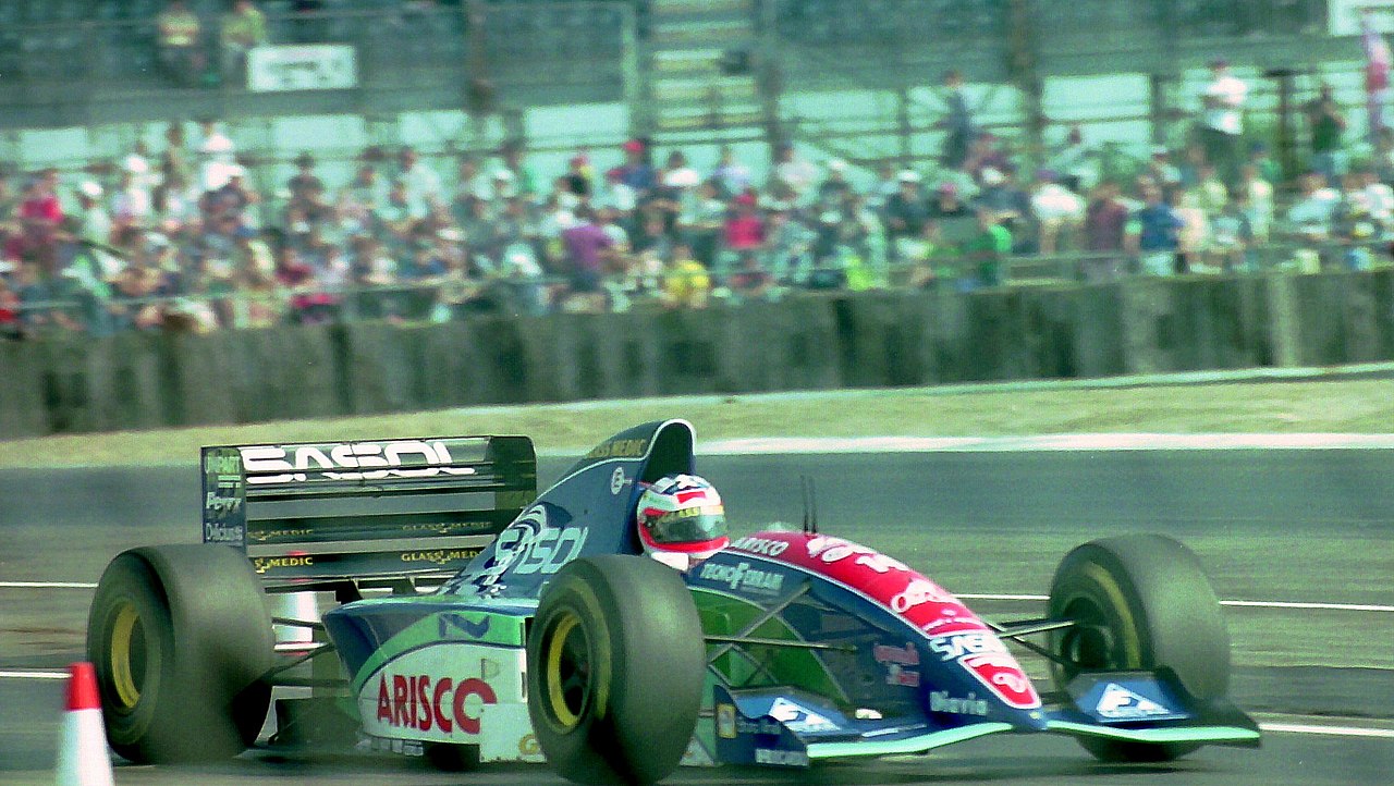 File:Rubens Barrichello Jordan 194 leaves the pit lane at 1994 British Grand Prix (32541336725).jpg Wikimedia Commons