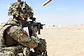 Soldier of the 1st Battalion, The Royal Anglian Regiment firing an L85A2 fitted with an ACOG, a railed handguard, and a Grip Pod