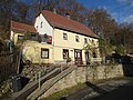 Residential house with retaining wall of the property