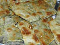 Soparnik, pita dalmata con bietole a foglia ("coste"), erba cipollina e prezzemolo, tipica per la regione di Poljica, tra Spalato ed Almissa
